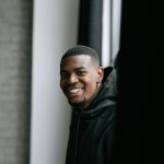 portrait of a smiling man indoors with